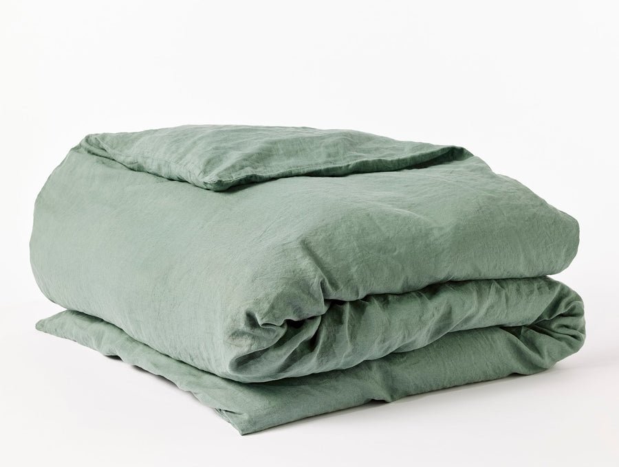 Coyuchi Organic Relaxed Linen Duvet Cover in juniper green, GOTS certified organic French flax linen, MADE SAFE certified, coconut shell buttons